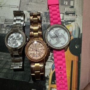 2 Guess watches and 1 Micheal Kors clearing out my closet. All 3 together.
